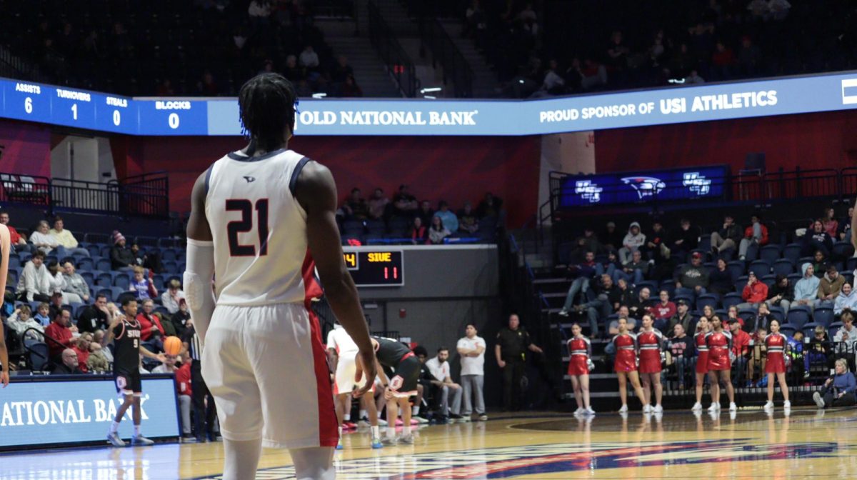 Ismail Habib, senior guard, watches as Southern Indiana pressures Southern Illinois University Edwardsville in the backcourt Saturday, Jan. 31, at Liberty Arena. (Photo by Anderson Schmidt)