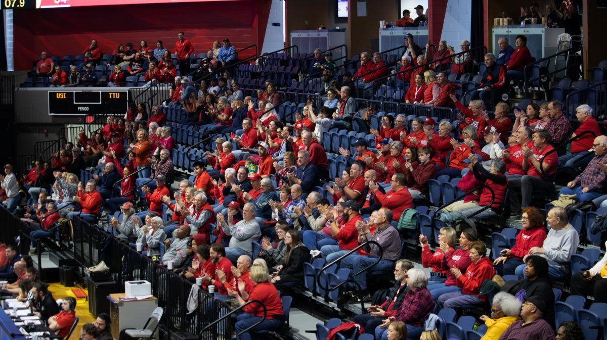 Fans watch Senior day 1