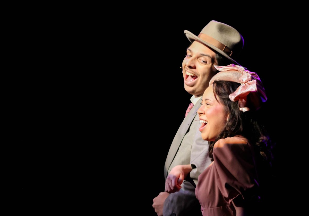 Young Ben (Cruz Quiroz) and young Phyllis (Abby Scheller) sing together during a rehearsal of “Farce and Follies: A USI Opera Event” in the Performance Center Friday, Jan. 30.