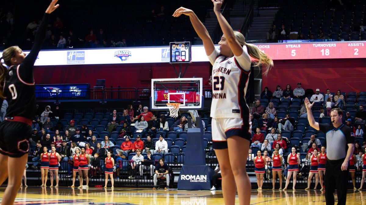 Lexi Sepulveda, sophomore guard, shoots a corner three-pointer against Southern Illinois University Edwardsville Saturday, Jan. 31, at Liberty Arena. (Photo by Anderson Schmidt)