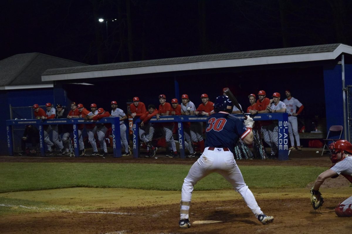 Micajah Wall, senior catcher, pulls his bat as he begins his swing during the game against Illinois State University Tuesday, March 3, at USI Baseball Field. (Photo by Anderson Schmidt)