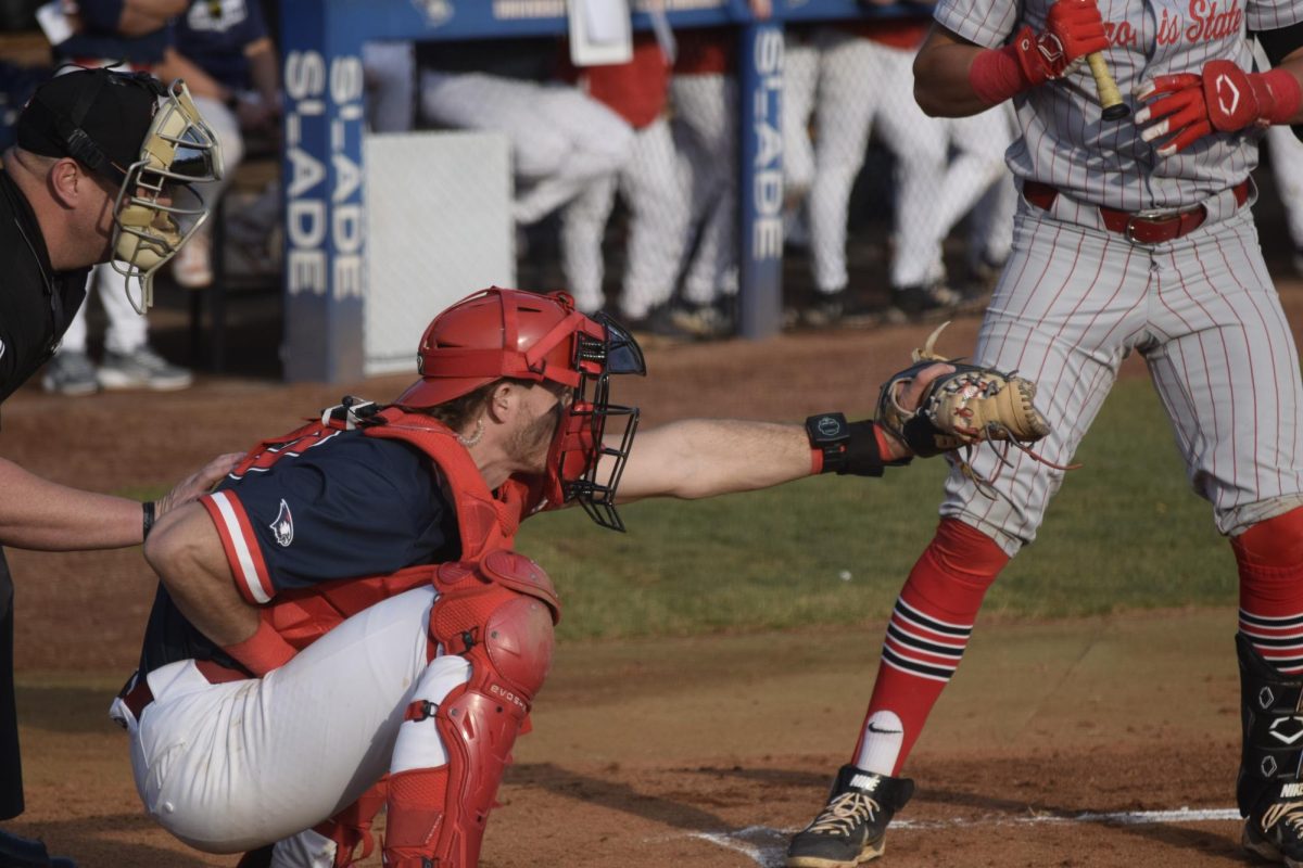 Micajah Wall, senior catcher, catches a strike down the middle during the game against Illinois State University Tuesday, March 3, at USI Baseball Field. (Photo by Anderson Schmidt)