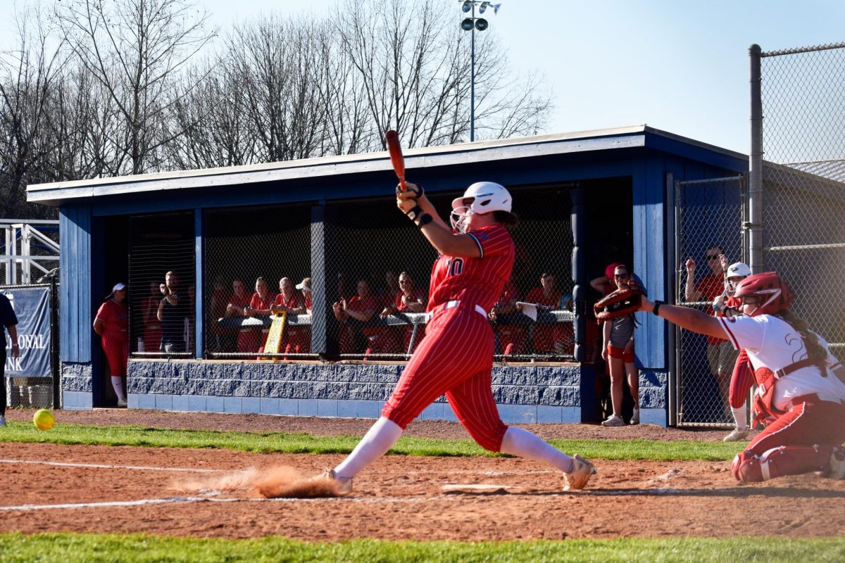 Grace Huffman, sophomore first baseman, hits a foul ball against Southeast Missouri State University Saturday, March 21 at USI Softball Field. (Photo by Anderson Schmidt)