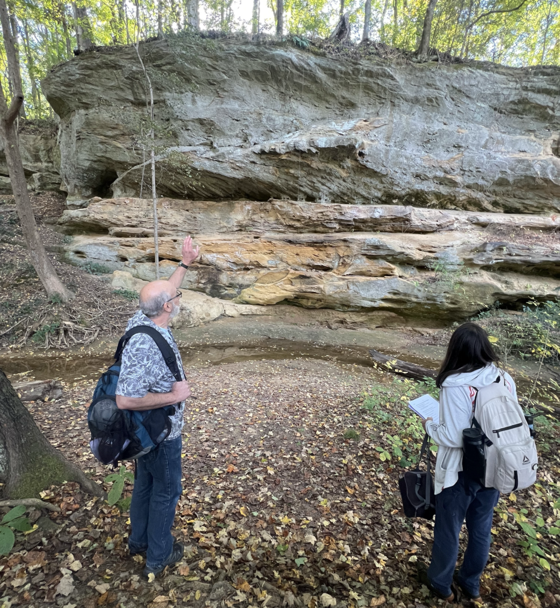 Tony Maria, professor of geology, leads a class on a campus field trip to show how different environments shaped USI’s land structure, waterways and surrounding geology. (Photo by Cade Smithson)