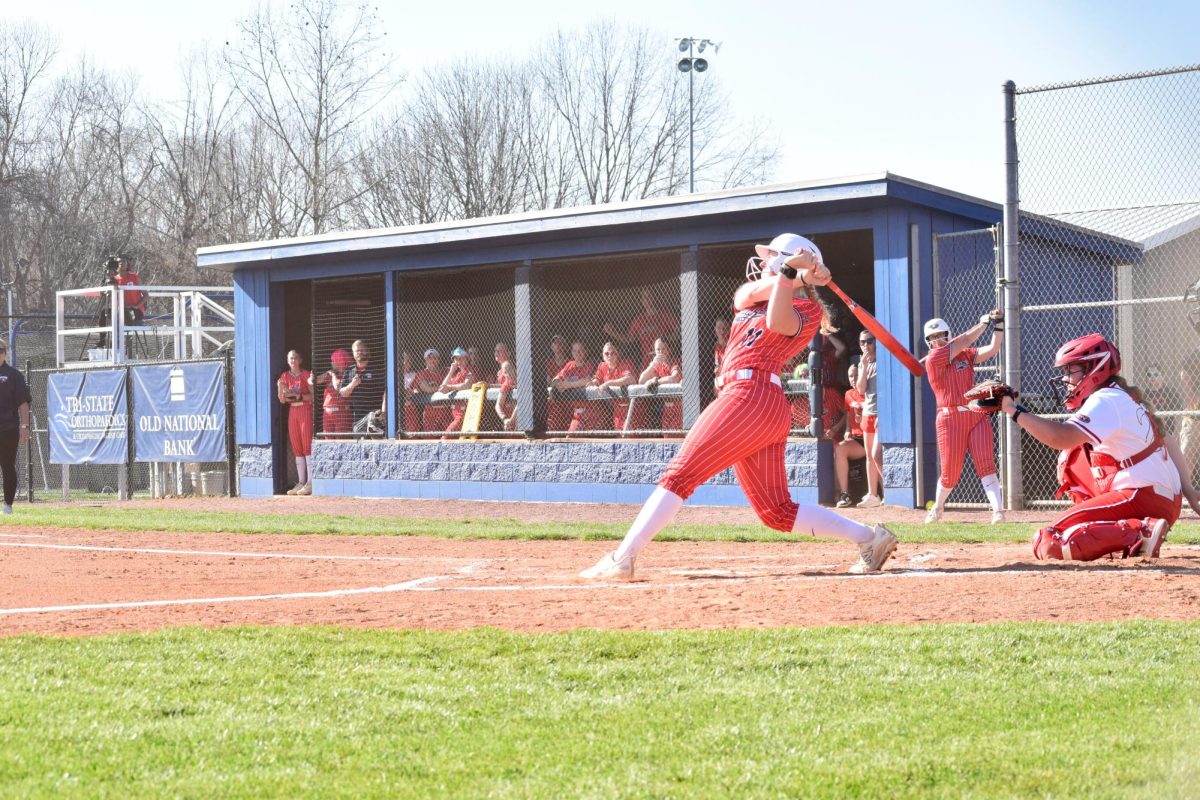 Jadyn Tinsley, freshman infielder, swings at a pitch against Southeast Missouri State University Saturday, March 21 at USI Softball Field. (Photo by Anderson Schmidt)