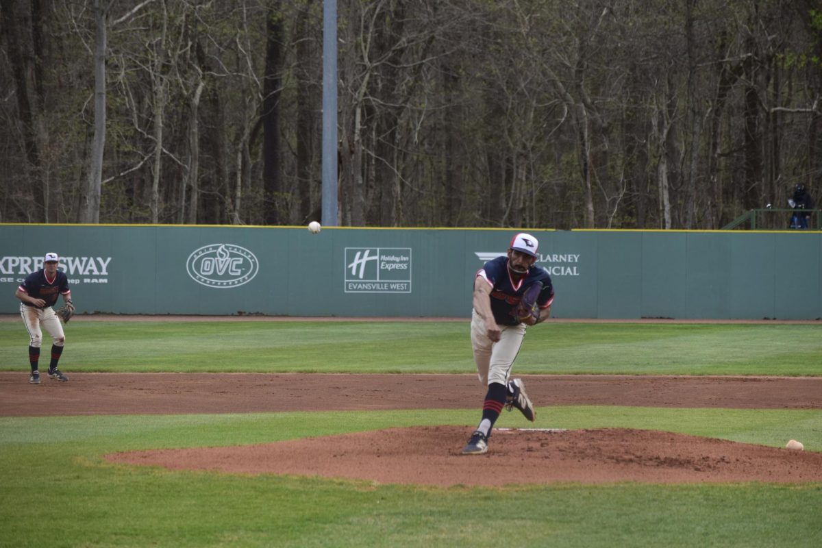 Abdriel Figueroa, junior pitcher, delivers a pitch against Southern Illinois University  Edwardsville Thursday, April 2, at USI Baseball Field. 