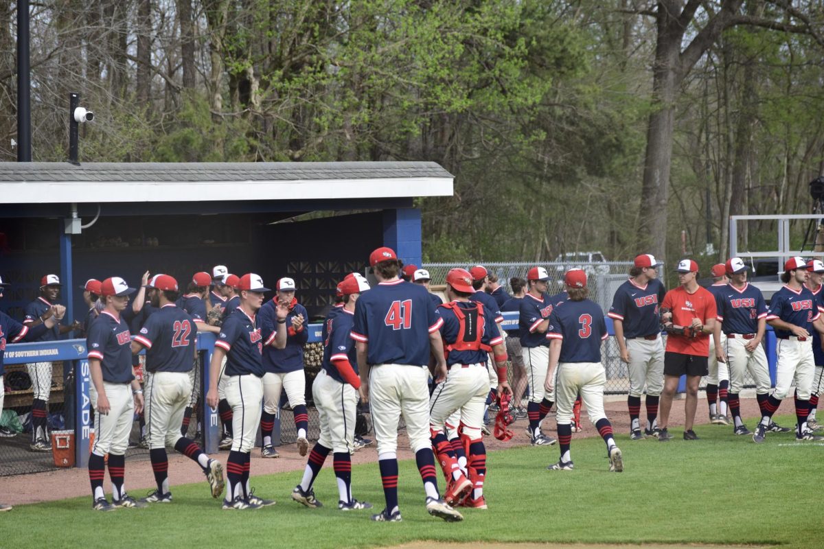 The USI Baseball team returns to the dugout after getting out of an inning against Southern Illinois University Edwardsville Thursday, April 2, at USI Baseball Field. 