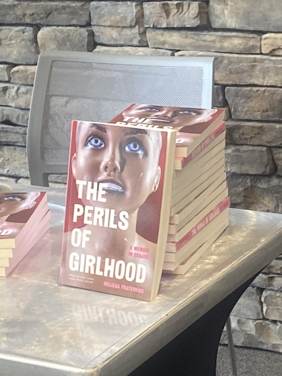 Melissa Fraterrigo’s newest book, The Perils of Girlhood: A Memoir in Essays, is on display at the Griffith Center Wed, April 8.