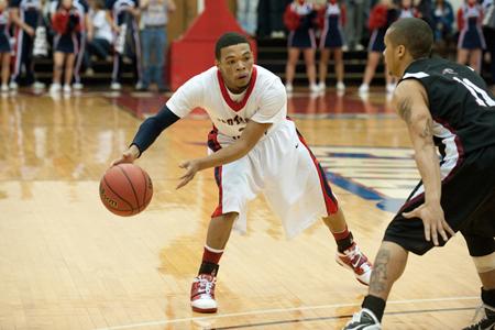 Kevin Gant, the newly appointed men’s basketball assistant coach, on the court during a game in 2011. Gant was a member of the team for three years until his graduation in 2012.
