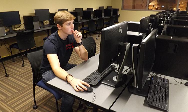 Freshman Eric Mason takes advantage of the new computer lab located on the top floor of the Recreation, Fitness and Wellness Center. 